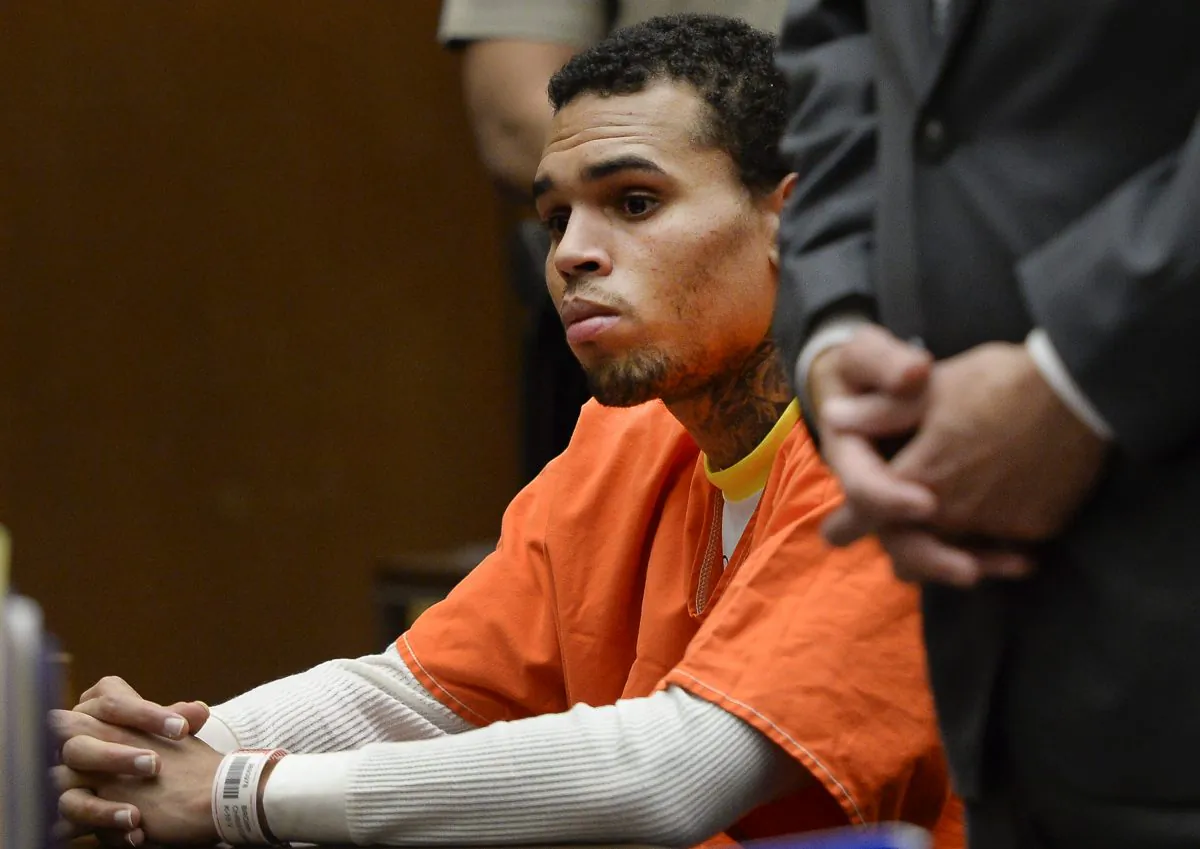 R&B singer Chris Brown appears in court on Thursday, May 1, 2014, in Los Angeles. Superior Court Judge James Brandlin ordered Brown to appear in court again next week to update him on efforts between the singer’s attorney and prosecutors to strike a deal on probation issues in the singer’s 2009 assault case filed after his attack on then-girlfriend Rihanna. (AP Photo/Kevork Djansezian, Pool)