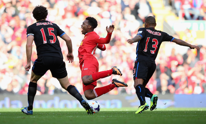 Daniel Sturridge of Liverpool is fouled by Jason Puncheon of Crystal Palace during the Barclays Premier League match between Liverpool and Crystal Palace at Anfield on October 5, 2013 in Liverpool, England. (Photo by Clive Brunskill/Getty Images)