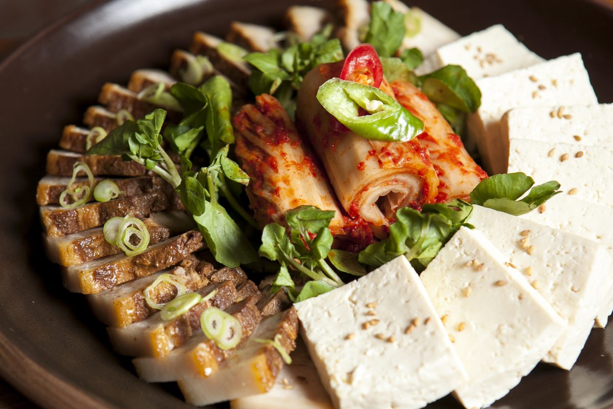 Tofu bossam (braised pork belly) with kimchi.