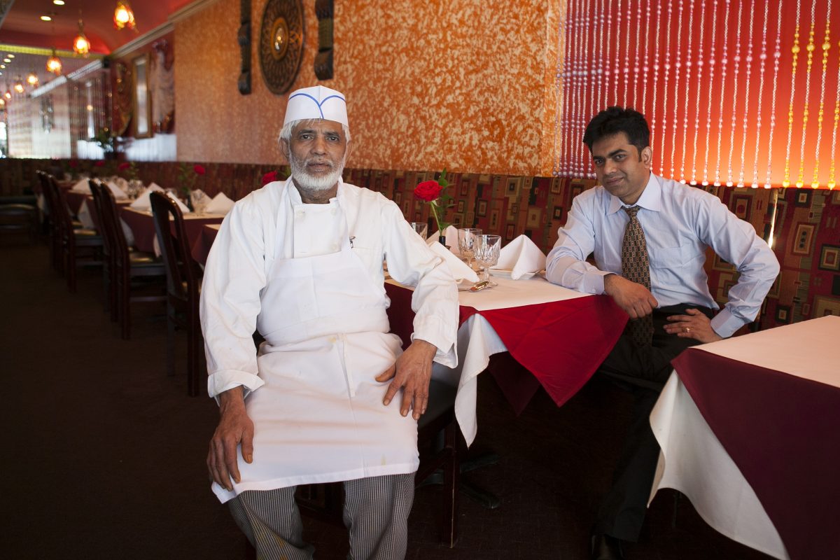 The family restaurant is run by Mohammed Jewel (R), his father chef Jamal Jewel (L), and his uncle Mohammed Islam, not pictured. (Samira Bouaou/Epoch Times)