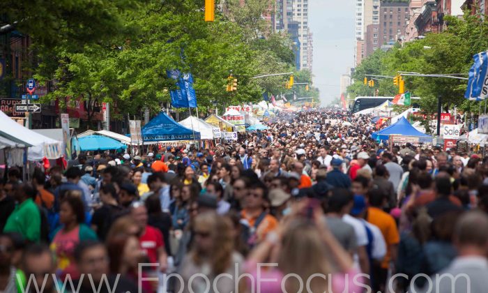 Thousands of people shop at booths at the Ninth Avenue International Food Festival, in New York City, on May 18, 2014. (Petr Svab/Epoch Times)