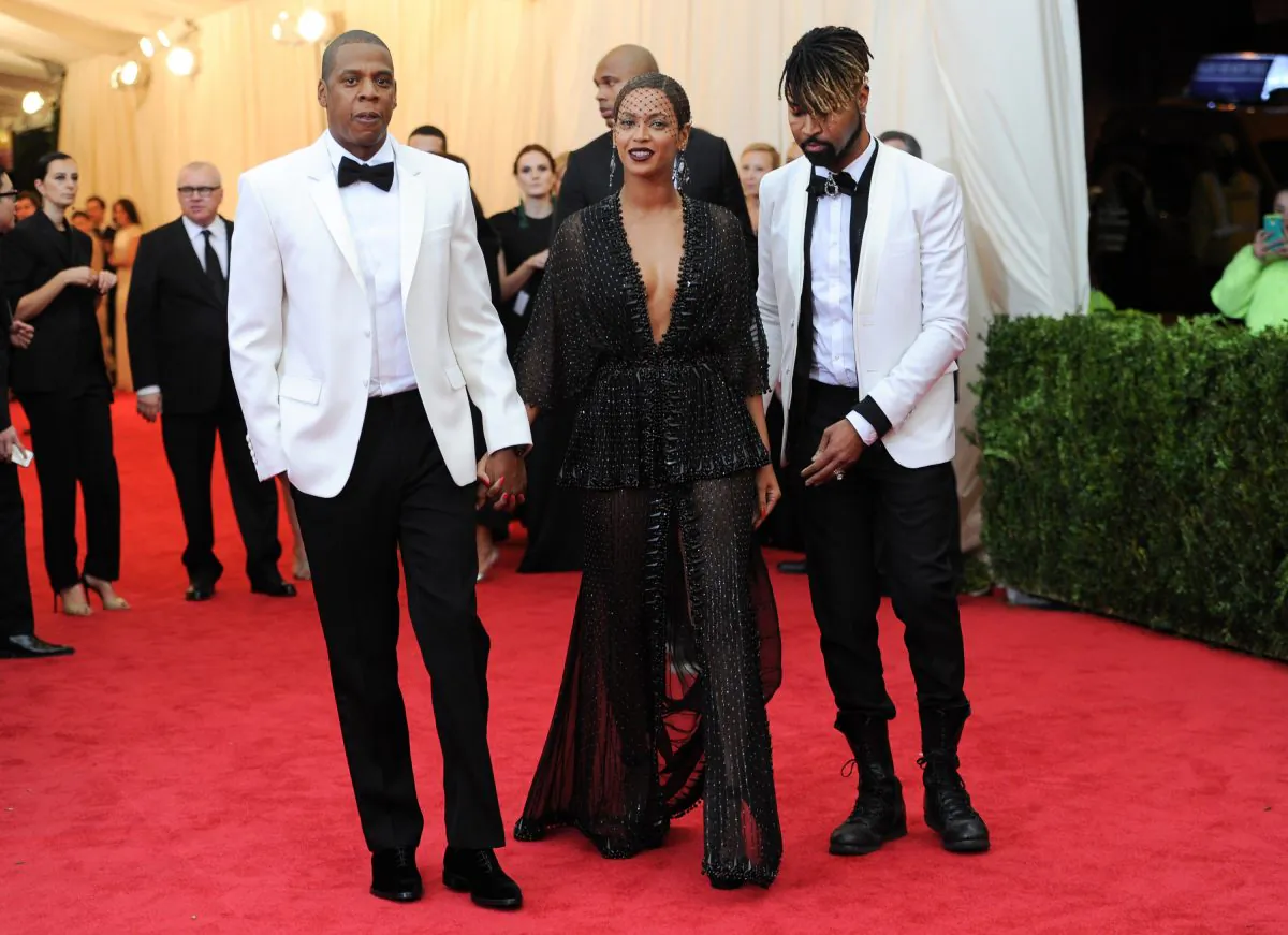 Jay Z, left, and Beyonce arrive at The Metropolitan Museum of Art’s Costume Institute benefit gala celebrating “Charles James: Beyond Fashion” in New York on Monday, May 5, 2014. (Evan Agostini/Invision/AP)