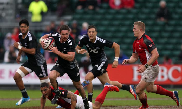 New Zealand’s Gillies Kaka drives forward in the Final against Canada at the IRB Glasgow Sevens at Scotstoun Stadium on May 4, 2014. New Zealand won this Final 54-7 and are all-but certain to win the series for the fourth consecutive time.
CREDIT: (Ian MacNicol/Getty Images)