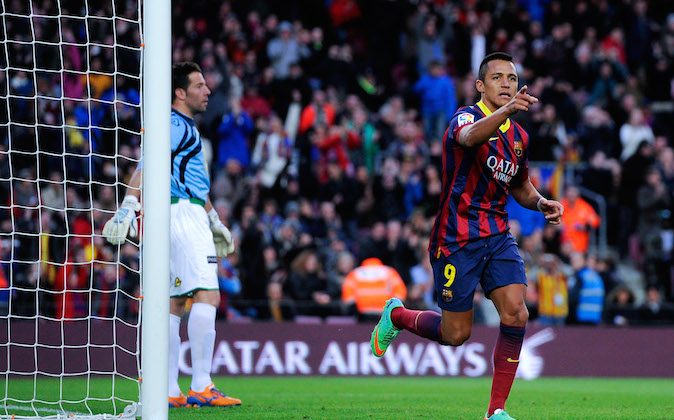 Alexis Sanchez of FC Barcelona celebrates after scoring his team's third goal during the La Liga match between FC Barcelona and Elche FC at Camp Nou on January 5, 2014 in Barcelona, Spain. (Photo by David Ramos/Getty Images)