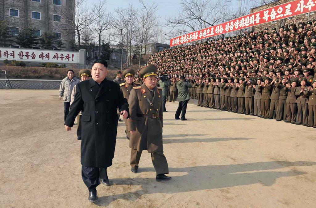 This undated picture released from North Korea's official Korean Central News Agency (KCNA) on January 12, 2014 shows North Korean leader Kim Jong-Un (front L) inspecting the command of Korean People's Army (KPA) Unit 534. (KNS/AFP/Getty Images)