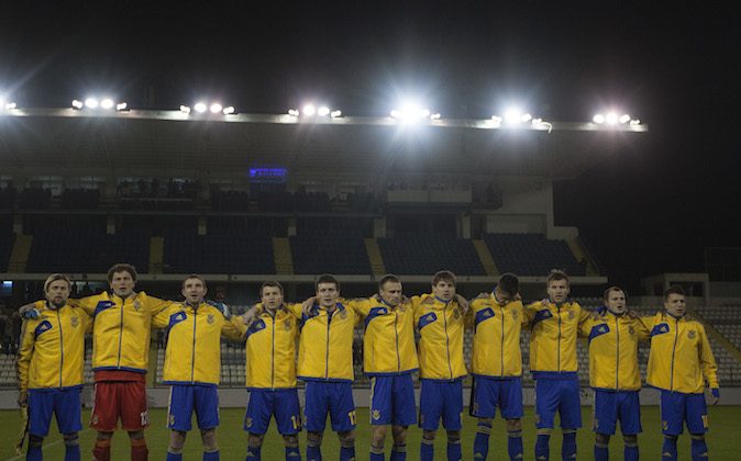  The Ukraine team stands for the national anthem during the Ukraine v USA International Friendly at Antonis Papadopoulos stadium on March 5, 2014 in Larnaca, Cyprus. (Photo by Andrew Caballero-Reynolds/Getty Images)