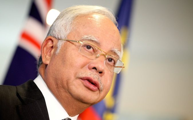 Malaysian Prime Minister Najib Razak addresses the media after a bilateral meeting at the Commonwealth Parliament Offices at Exchange Plaza on April 3, 2014 in Perth, Australia. (Richard Wainwright - Pool/Getty Images)