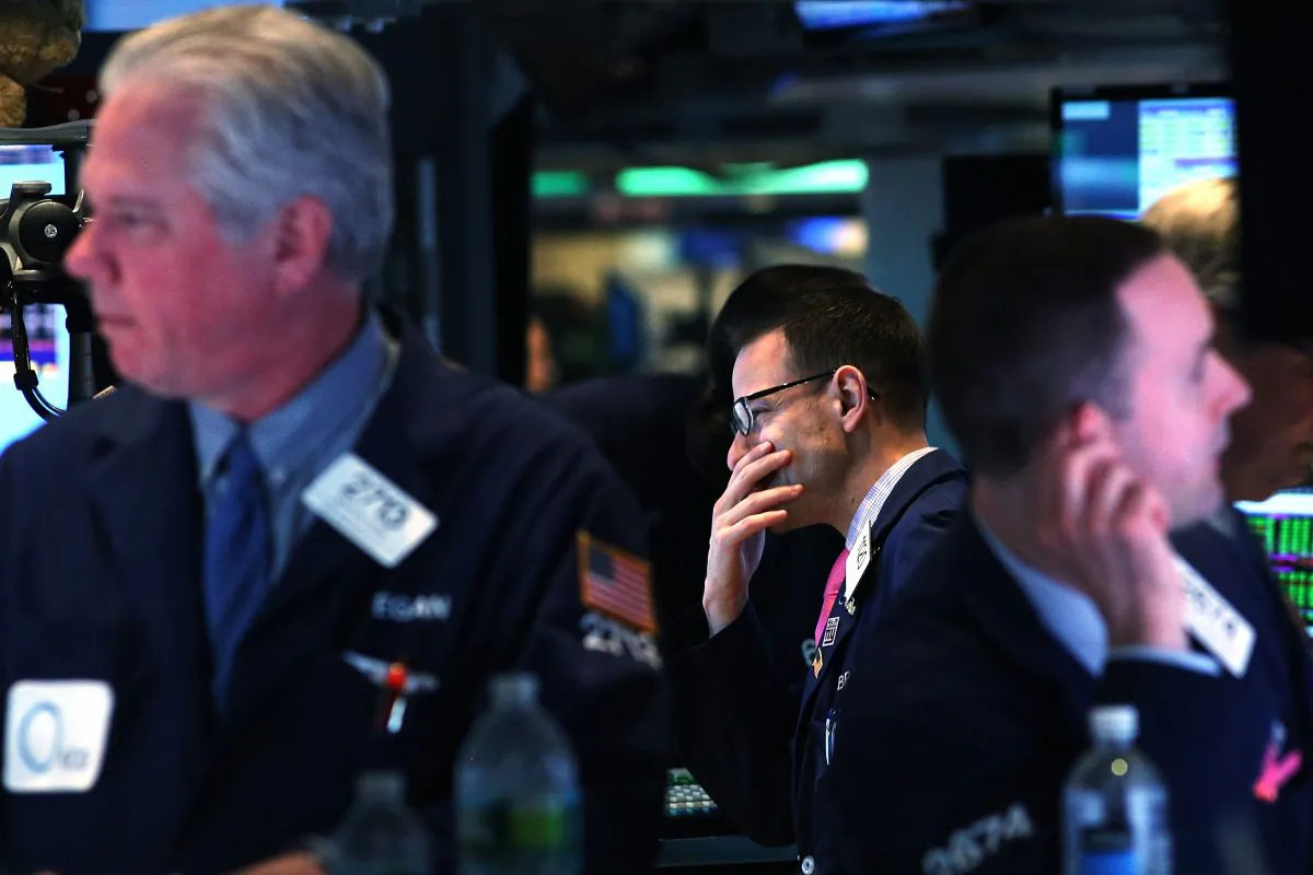 Traders work on the floor of the New York Stock Exchange. (Spencer Platt/Getty Images)