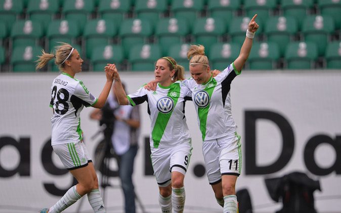  Alexandra Popp of Wolfsburg celebrates scoring her goal with Anna Blaesse during the UEFA Women's Champions League semi final second leg match between VfL Wolfsburg and 1. FFC Turbine Potsdam on April 27, 2014 in Wolfsburg, Germany. (Photo by Stuart Franklin/Getty Images)