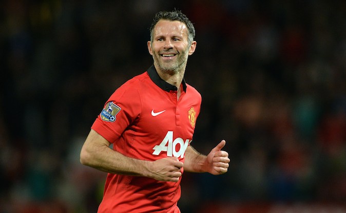 Manchester United's Interim Welsh player-manager Ryan Giggs smiles after taking a free kick during the English Premier League football match between Manchester United and Hull City at Old Trafford in Manchester, northwest England on May 6, 2014. (PAUL ELLIS/AFP/Getty Images)