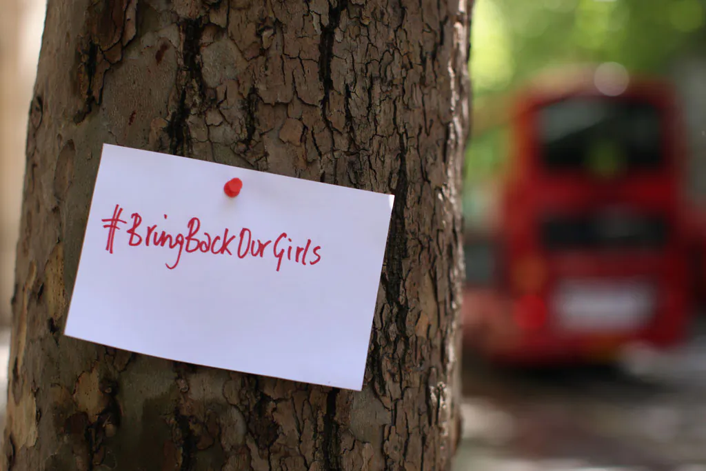 A sign that reads 'Bring back our girls' is pinned to a tree as protesters calling for the release of a group of abducted Nigerian schoolgirls gather outside Nigeria House on May 9, 2014 in London, England. 276 schoolgirls were abducted from their boarding school on 14 April, 2014 in the town of Chibok in north-eastern Borno state in Nigeria. The abductions have sparked protests around the world calling for the release of the girls who are being held by the militant group Boko Haram. (Dan Kitwood/Getty Images)