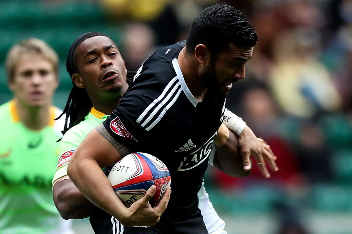 Sherwin Stowers of New Zealand is tackled by Branco du Preez of South Africa during the Marriot London Sevens match between South Africa and New Zealand at The Marriott London Sevens - Day 2 at Twickenham Stadium on May 11 in London. (Ben Hoskins/Getty Images Sport)