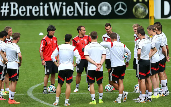 Head caoch Joachim Loew (L) gives instructiona to the team during the German National team training session at St.Martin training ground on May 30, 2014 in St. Martin in Passeier, Italy. (Photo by Martin Rose/Bongarts/Getty Images)