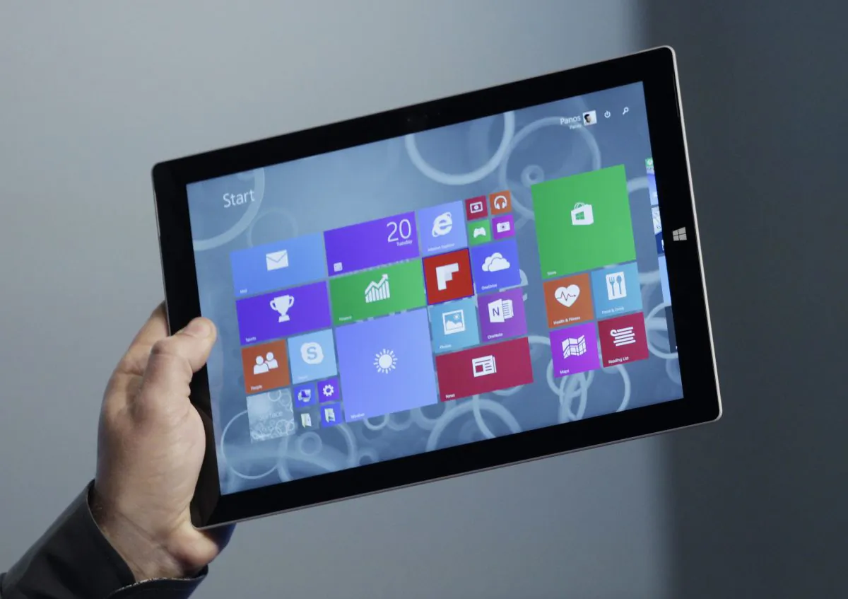 Panos Panay, Microsoft's vice president for surface computing, introduces the Surface Pro 3 tablet device at a media preview, Tuesday, May 20, 2014 in New York. The device will have a screen measuring 12 inches diagonally, up from 10.6 inches in previous models. Microsoft says it's also thinner and faster than before.  (AP Photo/Mark Lennihan)