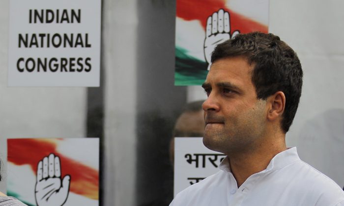 Congress party Vice President Rahul Gandhi arrives to address the media outside the party headquarters in New Delhi, India, Friday, May 16, 2014. (AP Photo/Altaf Qadri)