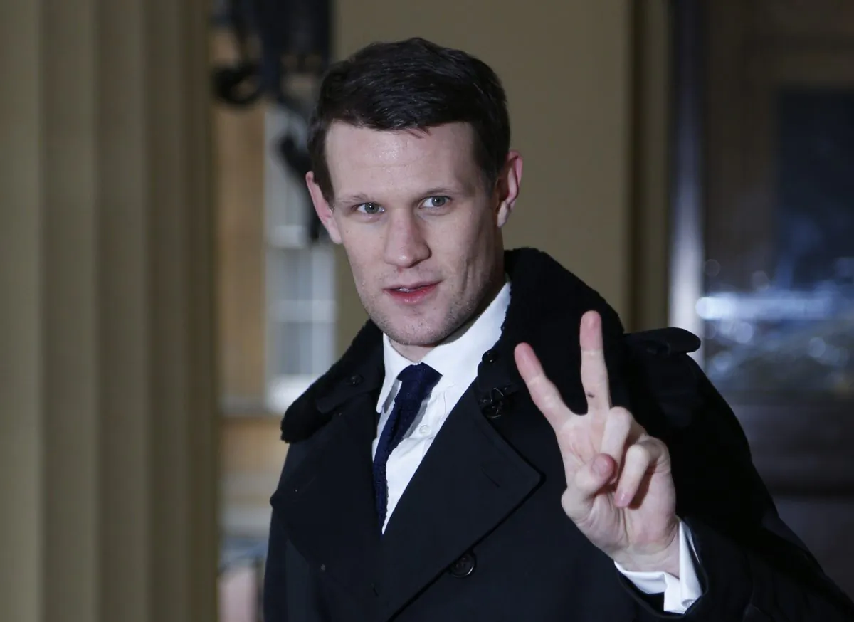 British actor Matt Smith, the eleventh incarnation of the Doctor role in the British television series Doctor Who, poses for the photographers as he arrives for a reception at Buckingham Palace, in central London, Monday, Nov. 18, 2013. Britain's Countess of Wessex hosted a reception to mark the 50th anniversary of the series. There have been 11 Doctors to date, and it now holds the Guinness World Record for the  longest running science fiction series in the world. (AP Photo/Lefteris Pitarakis, pool)
