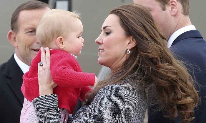 Kate the Duchess of Cambridge holds Prince George as they say  goodbye before they board their flight in Canberra,  Australia, Friday, April 25, 2014. (AP Photo/Rob Griffith)