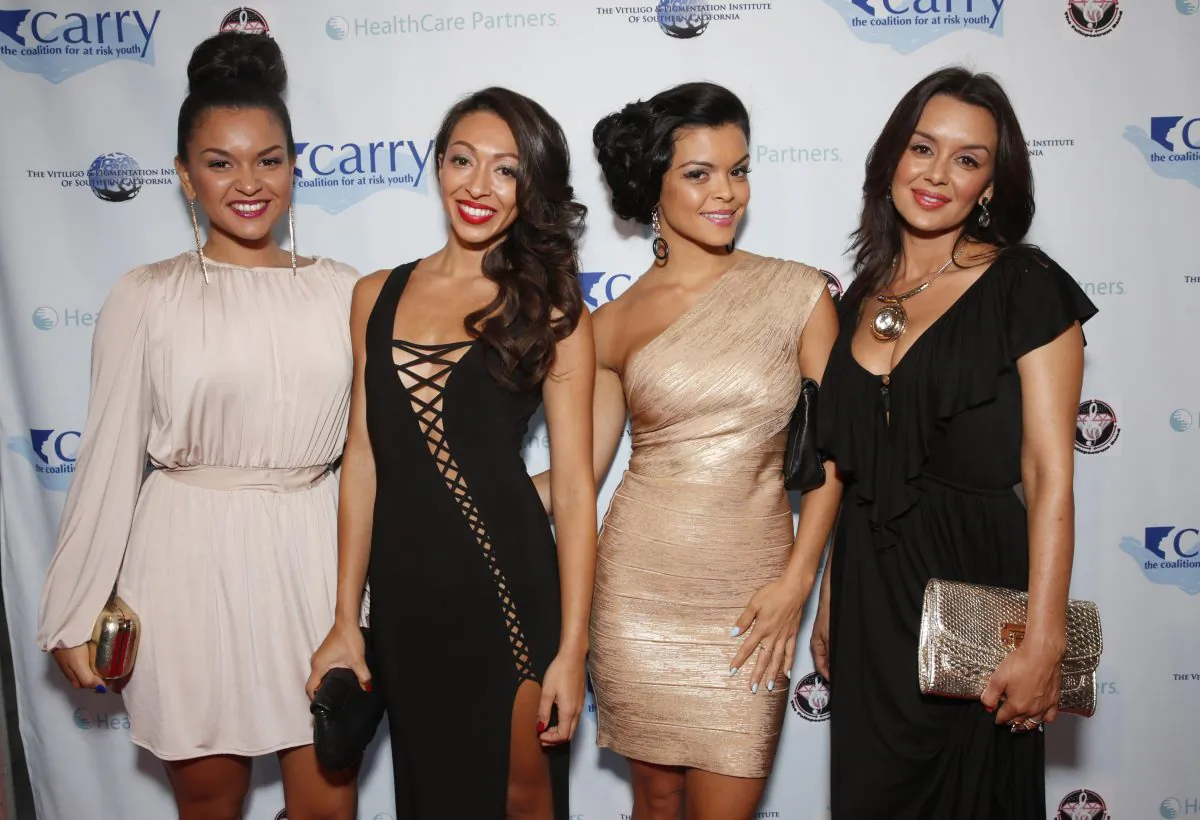 FILE - In this May 11, 2013 file photo released by the CARRY Foundation, The Lylas attend the CARRY Foundation's 7th Annual "Shall We Dance" Gala at The Beverly Hilton Hotel in Beverly Hills, Calif.  The Lylas is one of a new crop of girl groups currently on the music scene. (AP Photo/CARRY Foundation, Todd Williamson, File)