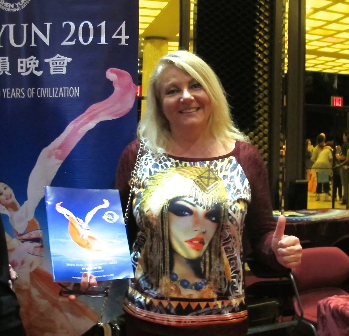 Larissa Garrett enjoys Shen Yun Performing Arts at the Blaisdell Concert Hall, in Honolulu, on May 7, 2014. (Jing Liang/Epoch Times)