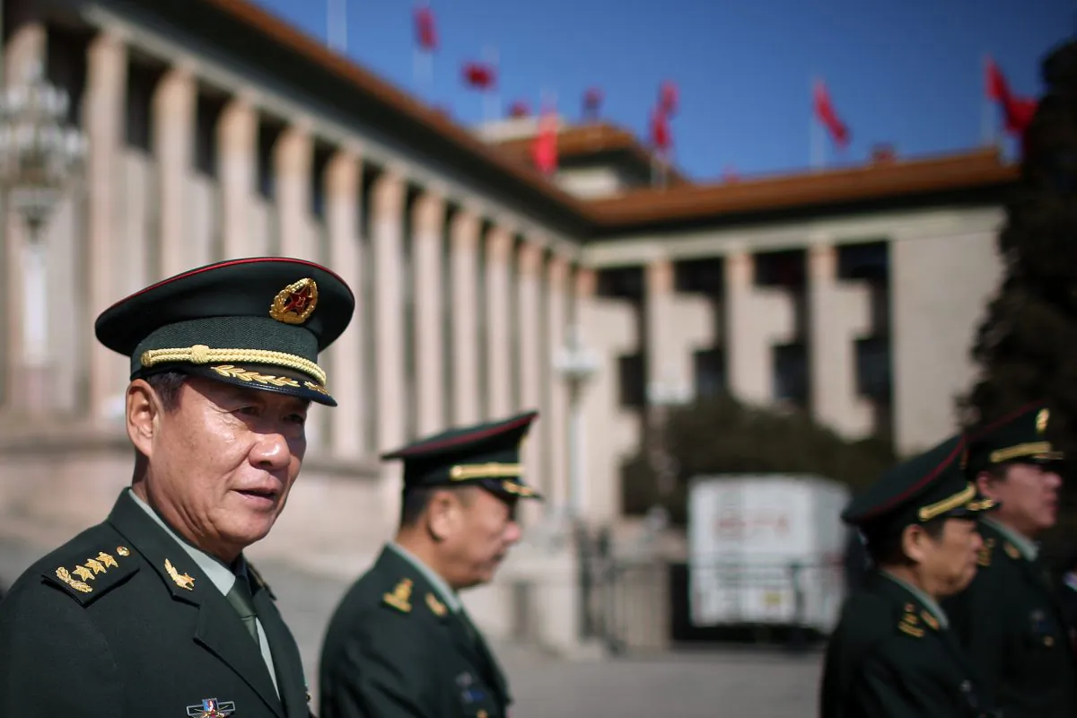 General Liu Yuan (Left), political commissar of the General Logistics Department of China's military, leaves the Great Hall of the People on March 4 in Beijing. The Chinese regime employs many tools of deception to advance its military goals. (Feng Li/Getty Images)
