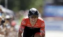 Cyclist Celebrates Lap Too Early