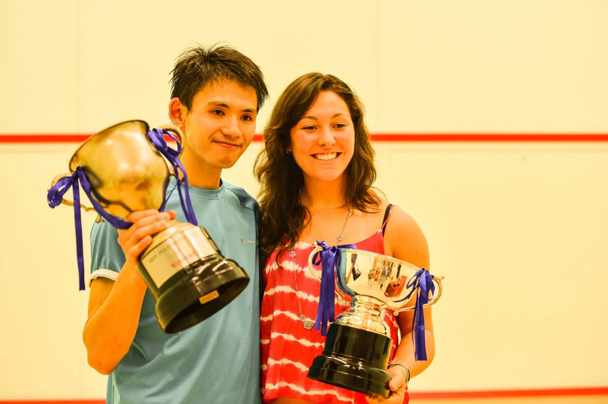 Max Lee Ho Yin and Amanda Sobhy celebrate their respective wins in the Men’s and Women’s Finals of the HKFC Meco PSA/WSA International 25 tournament at the Hong Kong Football Club on Saturday May 24. (Eddie So)