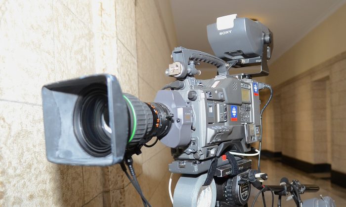 A CBC camera stands ready. With budget cuts and a changing media landscape, what’s the best way for the public broadcaster to continue, asks Michael Geist, Canada Research Chair in Internet and E-commerce Law at the University of Ottawa. (Matthew Little/Epoch Times)