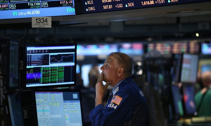 Traders work on the floor of the New York Stock Exchange on May 21, 2014 in New York City. (Spencer Platt/Getty Images)