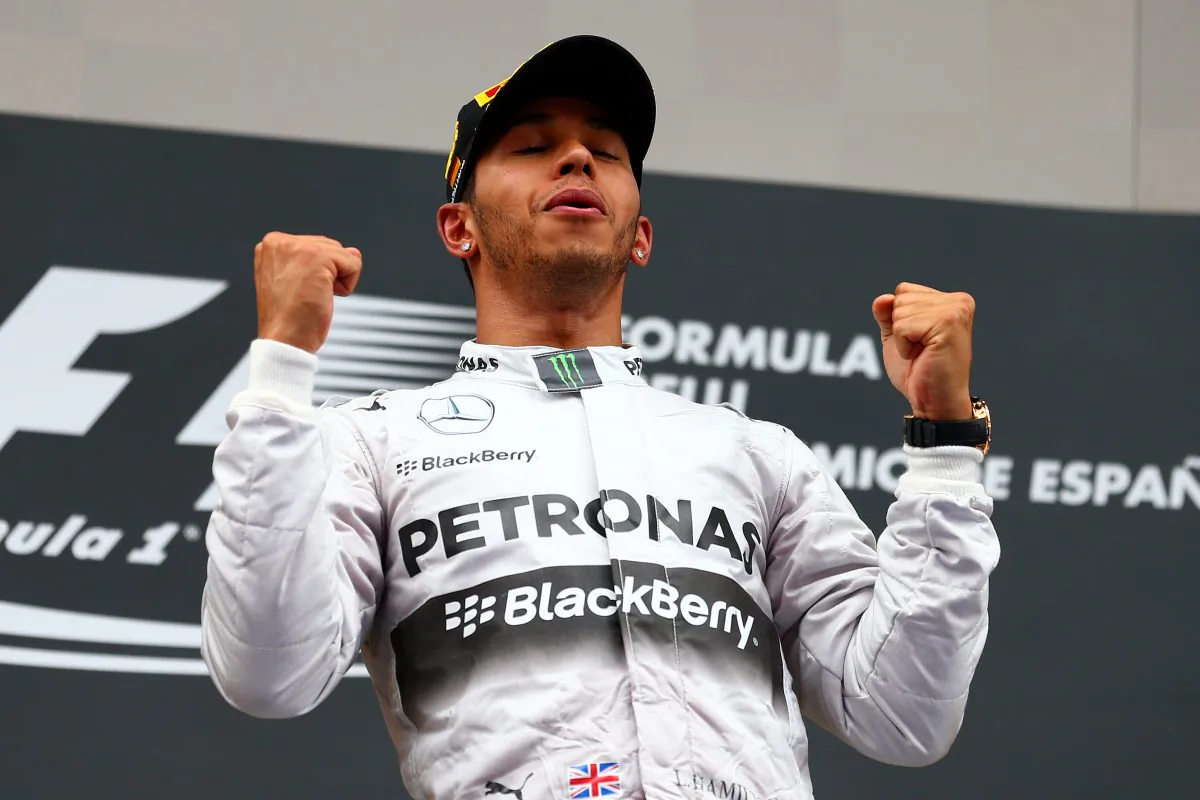 Race winner Lewis Hamilton of Mercedes GP might be gesturing truimphantly but his face reflects the relief he feels to have held of teammate Nico Rosberg to win the Formula One Spanish Grand Prix at Circuit de Catalunya on May 11, 2014. (Dan Istitene/Getty Images)
