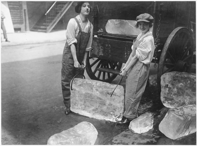  Girls help deliver ice on Sept. 16, 1918—work usually done by men—to help out during WWI. 