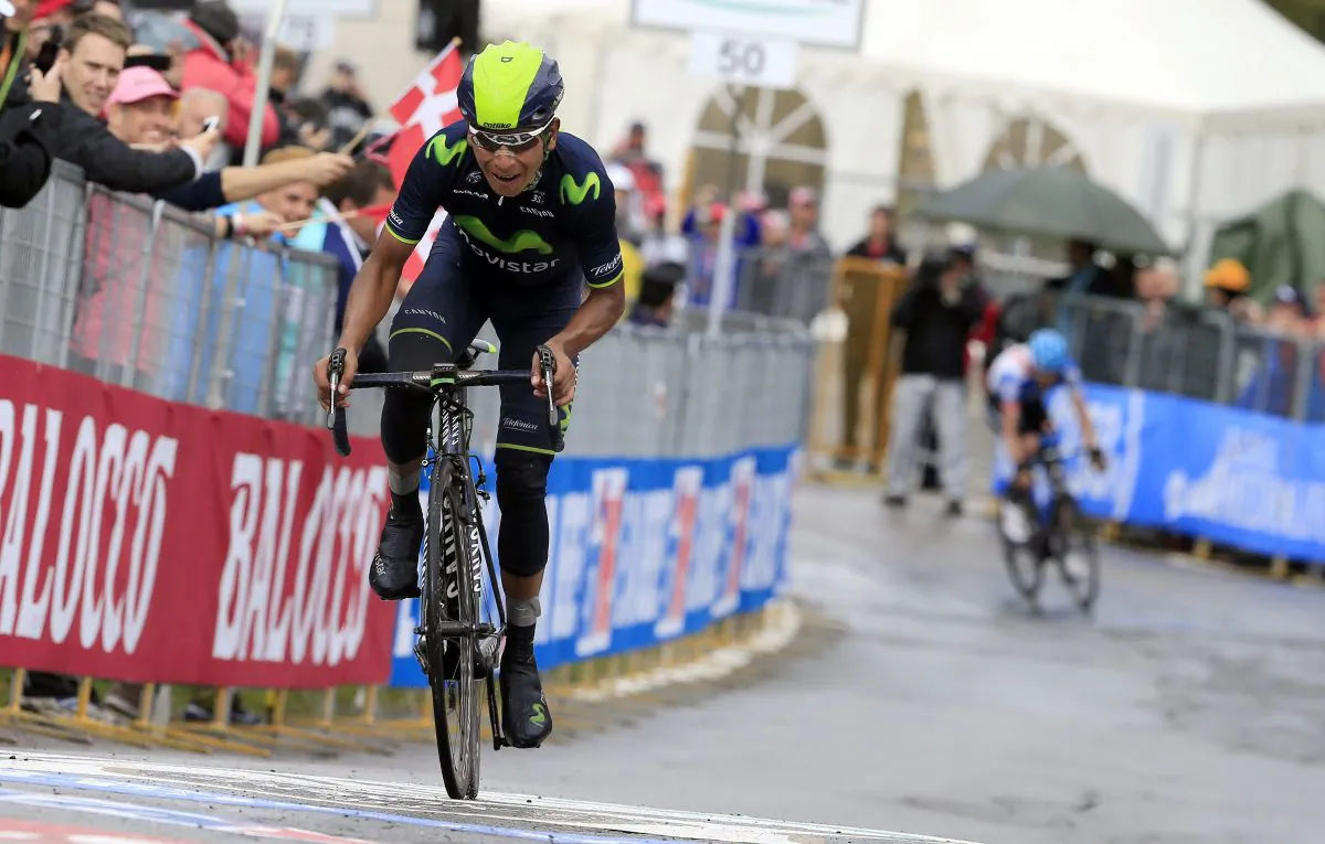 Movistar's Nairo Quintana rides away from Garmin-Sharp's Ryder hesjedal on the way to the finish line of Stage 16 of the 97th Giro d'Italia, 139 km from Ponte di Legno to Val Martello, on May 27, 2014 in Val Martello. Quintana took the overall leader's pink jersey with the stage win. (Luk Benies/AFP/Getty Images)