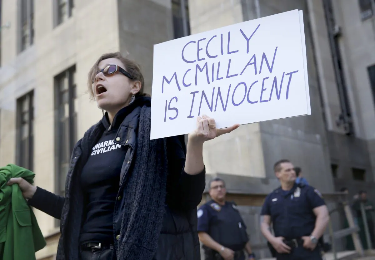 Sarah Wellington stands in front of the courthouse after the sentencing of Occupy Wall Street activist Cecily McMillan in Manhattan, on May 19, 2014. (Seth Wenig/AP)