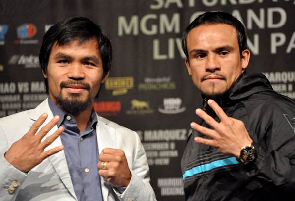 Manny Pacquiao (left) and Juan Manuel Marquez (right) at a press conference before there 4th bout. (bing.com)
