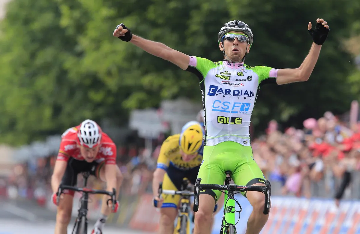 Stefano Pirazzi (Bardiani-CSF) celebrates his victory as he crosses the finish line of the 17th stage of the 97th Giro d'Italia, Tour of Italy from Sarnonico to Vittorio Veneto on May 28, 2014 in Vittorio Veneto. (Luk Benies/AFP/Getty Images)