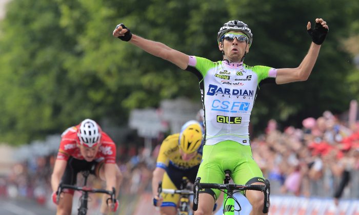 Stefano Pirazzi (Bardiani-CSF) celebrates his victory as he crosses the finish line of the 17th stage of the 97th Giro d'Italia, Tour of Italy from Sarnonico to Vittorio Veneto on May 28, 2014 in Vittorio Veneto. (Luk Benies/AFP/Getty Images)
