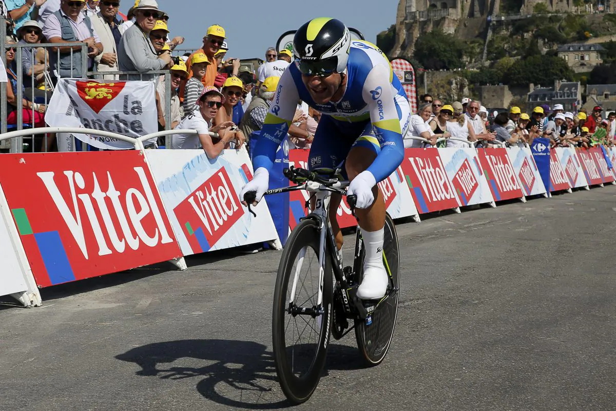 Canada's Svein Tuft smiles as he is about to cross the finish line in Stage 11 of the 2013 Tour de France, July 10, 2013. On May 9, 2014, he finished first in Stage One of the Giro d'Italia. (Pascal Guyot/AFP/Getty Images)