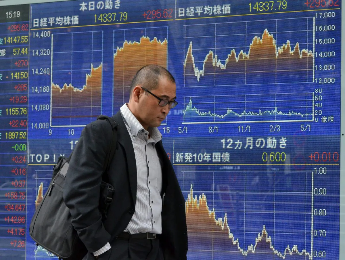 A share prices board in Tokyo on May 22, 2014. (Yoshikazu Tsuno/AFP/Getty Images)