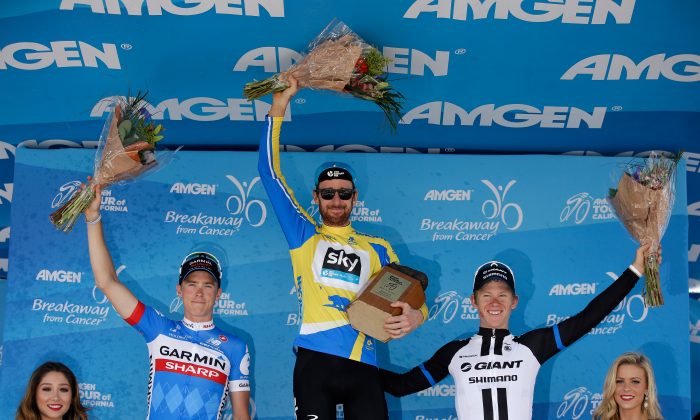 (L-R) Second place overall finisher Rohan Dennis of Garmin-Sharp, first place finisher Sir Bradley Wiggins of Sky and third place finisher Lawson Craddock riding for Giant-Shimano stand on the podium following Stage Eight of the 2014 Amgen Tour of California on May 18, 2014 in Thousand Oaks, California. (Ezra Shaw/Getty Images)