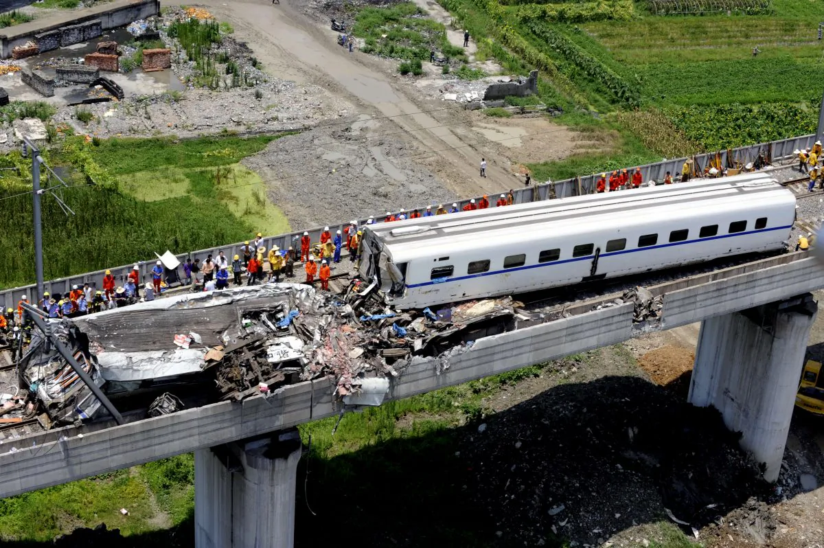 Rescue operations on the wreckage of two high-speed trains that collided on the outskirts of Wenzhou in the eastern Chinese province of Zhejiang on July 23, 2011 (photo taken on July 24). The train crash killed 35 people and injured over 200. (AFP/Getty Images)