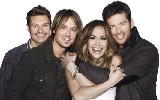 Ryan Seacrest and the three judges are all expected back for the upcoming season 14 of American Idol. (Fox)
