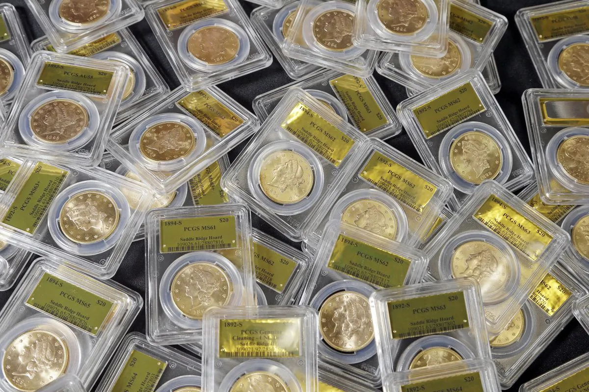This photo shows some of the 1,427 Gold-Rush era U.S. gold coins displayed at Professional Coin Grading Service in Santa Ana, Calif.. on Feb. 24, 2015. (Reed Saxon/AP Photo)