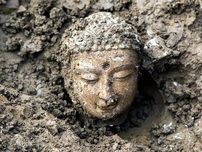 One of the 3,000 Buddha statues uncovered in 2012. (Sun Zifa/ImagineChina/AP)