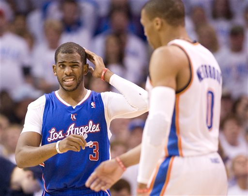Los Angeles Clippers' guard Chris Paul rubs his head during a timeout after a foul was called on Oklahoma City Thunder's guard Russell Westbrook for bumping Pauls head during the first half in Game 5 of the NBA Western Conference semi-finals at the Chesapeake Arena in Oklahoma City on Tuesday, May 13, 2014. (AP Photo/The Orange County Register, Michael Goulding)