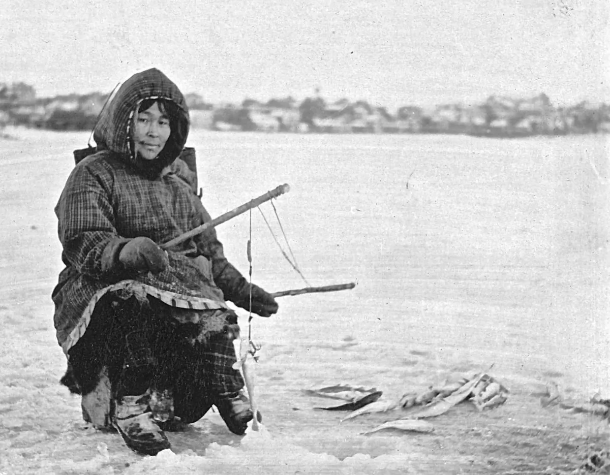 This archival photo shows an Eskimo woman ice fishing in Nome, Alaska. The long-held assumption that the so-called “Eskimo diet” of high levels of marine animals helps reduce heart disease has been debunked by Canadian researchers. (US Library of Congress)