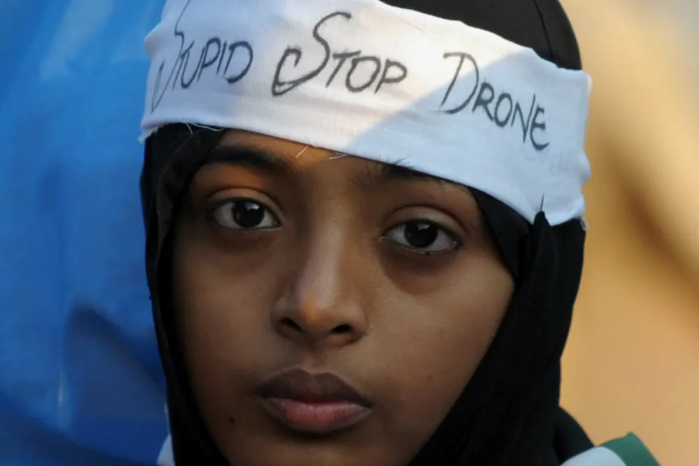 An activist of Pakistan Jamaat-e-Islami party takes part of a protest rally in Karachi on November 24, 2013, against US drone strikes. (Rizwan Tabassum/AFP/Getty Images)