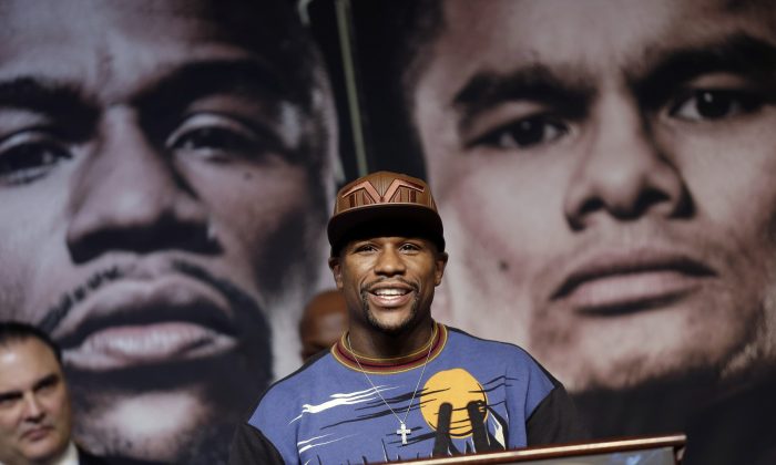 Boxer Floyd Mayweather Jr. speaks during a news conference Wednesday, April 30, 2014, in Las Vegas. Mayweather will face Marcos Maidana in a welterweight title fight on Saturday, May 3.  (AP Photo/Isaac Brekken)