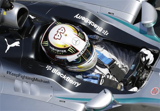 Mercedes driver Lewis Hamilton of Britain steers his car during the second free practice at the Barcelona Catalunya racetrack in Montmelo, near Barcelona, Spain, Friday, May 9, 2014. Lewis Hamilton finished Friday's opening day of practice at the Spanish Grand Prix with the top times from both training sessions. The British driver is looking to add to his three poles positions and hat trick of wins after four races this season. The Formula One race will be held on Sunday. (AP Photo/Luca Bruno)
