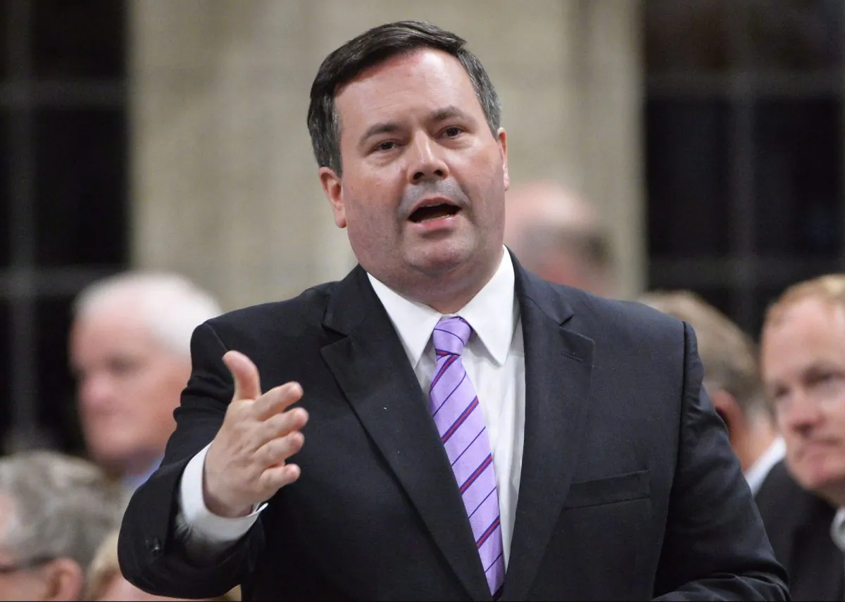Employment Minister Jason Kenney responds during question period in the House of Commons on May 27, 2014. UN Watch, a Geneva-based human rights group, presented Kenney with its Moral Courage Award on May 22, 2014, for speaking up for victims of tyranny around the world. (The Canadian Press/Adrian Wyld)