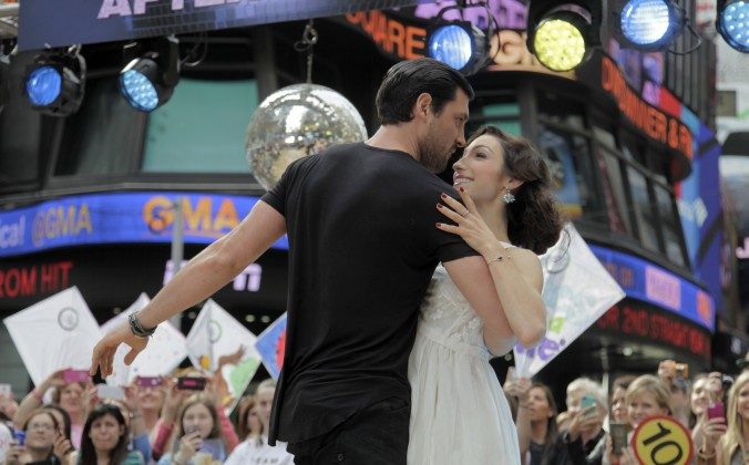 Olympic athlete Meryl Davis, right, and dancer Maksim Chmerkovskiy, winners of "Dancing with the Stars," appear on ABC's Good Morning America on Wednesday, May 21, 2014, in New York. (Andy Kropa/Invision/AP)