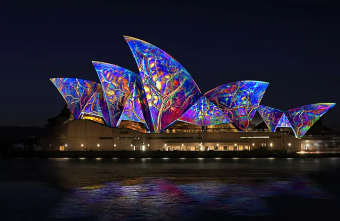 Bright lights, big city - in the 1950s lighting for productivity and security was overtaken by lighting for spectacle, mood and advertising. (Lighting the Sails, 59 Productions Vivid LIVE 2014)